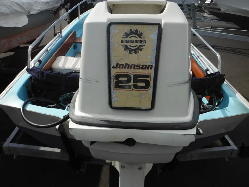 Slide: The Image of 1998 Boston Whaler 13 Sport with Johnson 25 outboard motor, rear view. - 8
