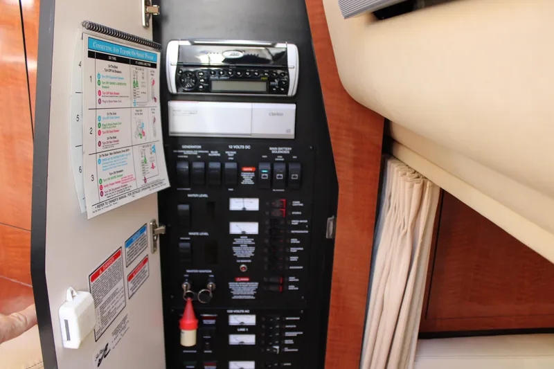 Slide: The Image of Electrical panel inside 2005 Sea Ray 340 Sundancer boat cabin. - 25