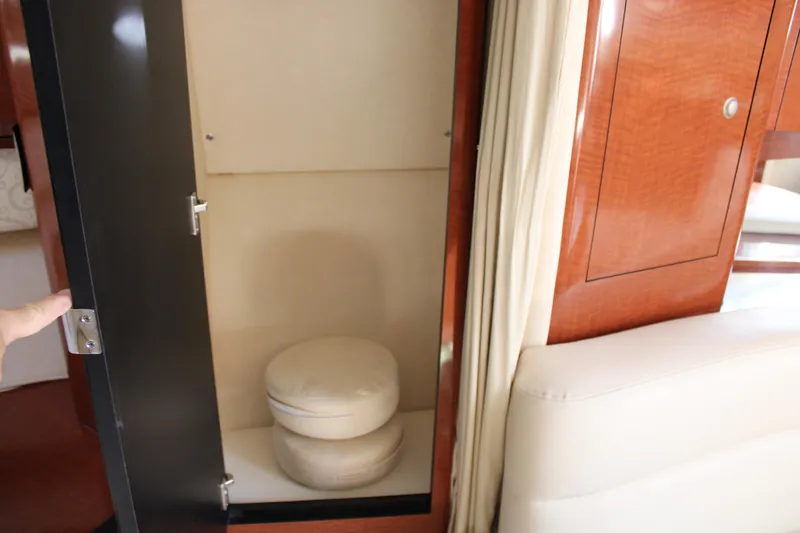 Slide: The Image of 2005 Sea Ray 340 Sundancer interior storage with cushions. - 33