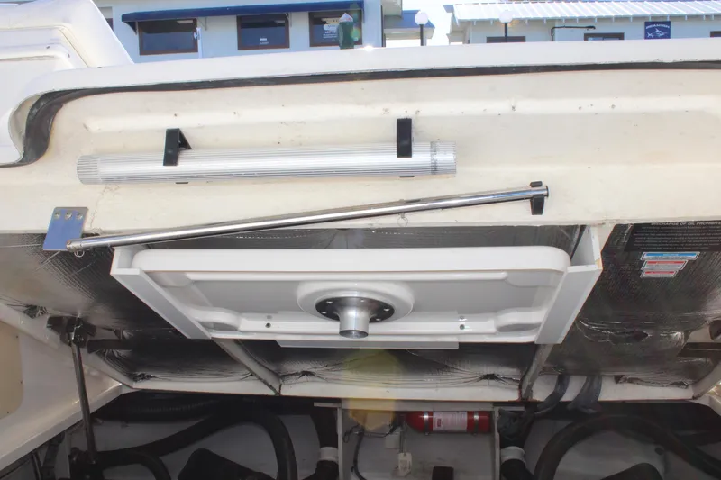 Slide: The Image of Engine compartment of 2005 Sea Ray 340 Sundancer boat, showing mechanical components. - 40