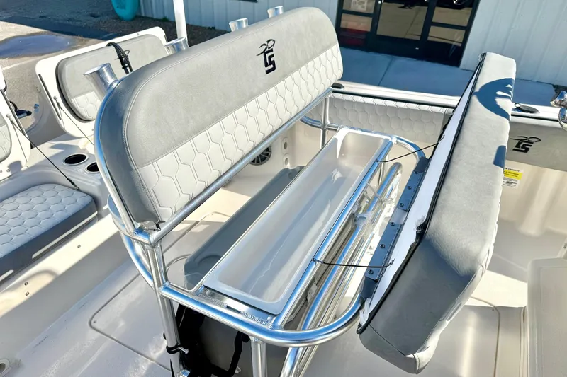 Slide: The Image of 2025 Carolina Skiff 21 Ultra Elite boat interior, featuring sleek white design and modern fittings. - 24