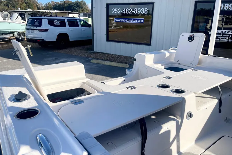 Slide: The Image of 2025 Carolina Skiff 21 Ultra Elite interior with cushioned seating and speaker detail. - 32