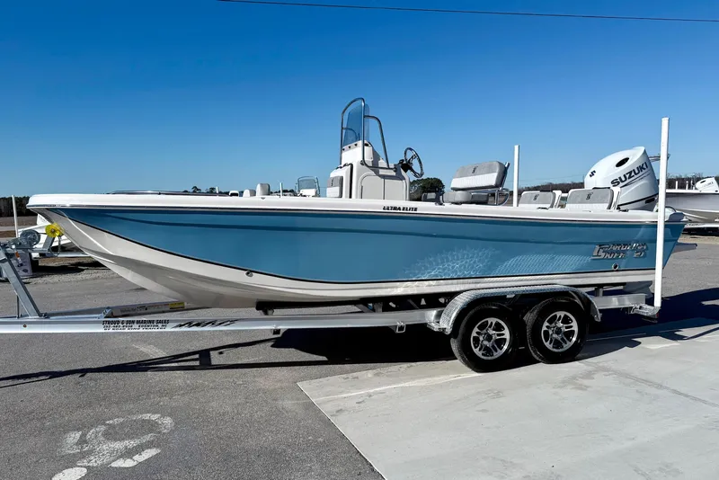 Slide: The Image of 2025 Carolina Skiff 21 Ultra Elite boat on trailer at Stroud & Son Marine. - 4