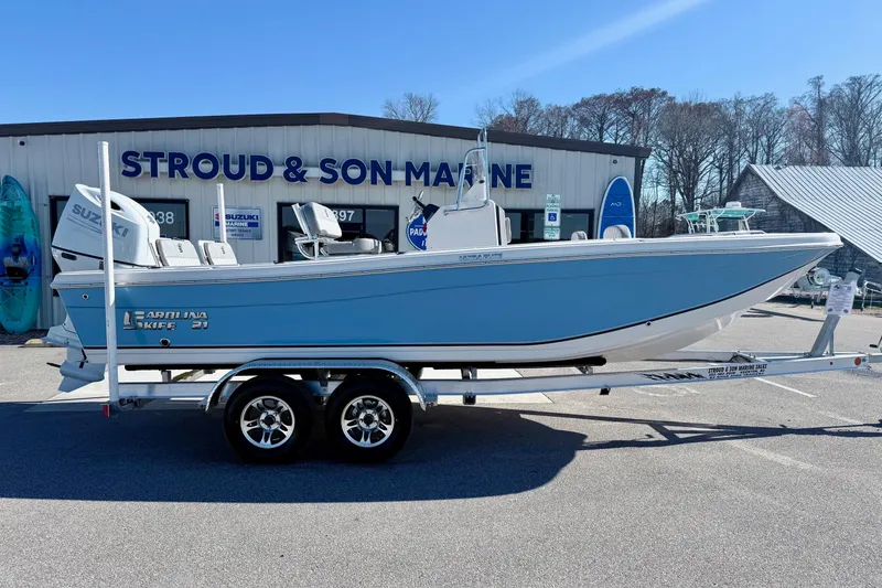 Slide: The Image of 2025 Carolina Skiff 21 Ultra Elite boat on trailer at Stroud & Son Marine dealership. - 6