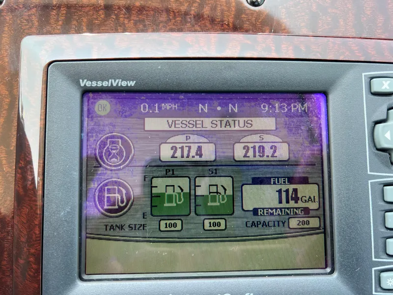 Slide: The Image of VesselView display on 2011 Sea Ray 330 Sundancer showing fuel status and engine data. - 11