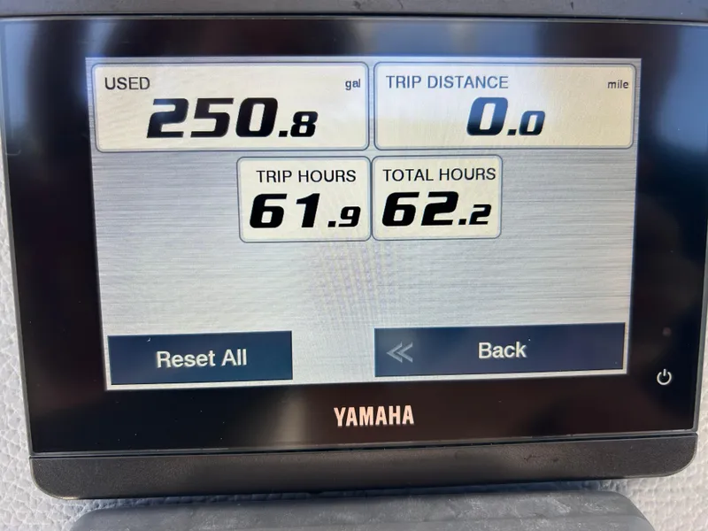 Slide: The Image of Yamaha display showing fuel usage, trip distance, and hours for Release 210 RX, 2023 model. - 46