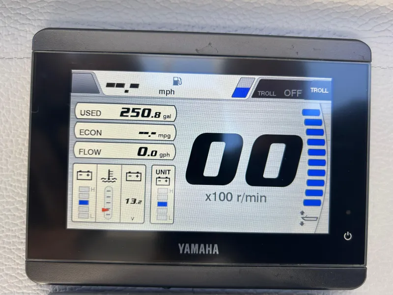 Slide: The Image of Yamaha display showing fuel usage and engine RPM on Release 210 RX, 2023 model. - 47