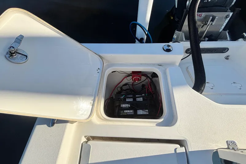 Slide: The Image of Open battery compartment on 2017 Key West 230 Bay Reef boat. - 20