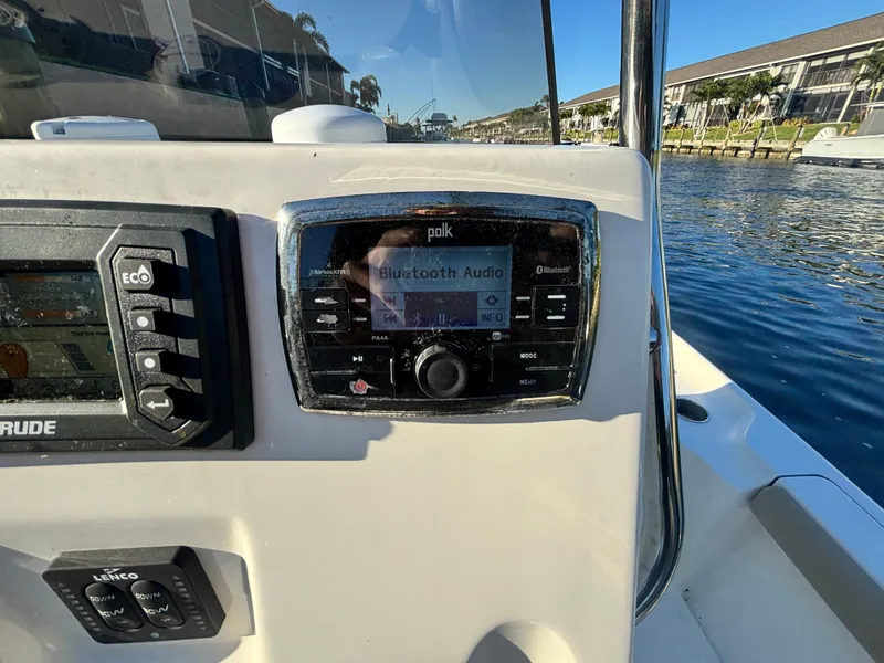 Slide: The Image of Control panel of a 2017 Key West 230 Bay Reef boat with Bluetooth audio system. - 6