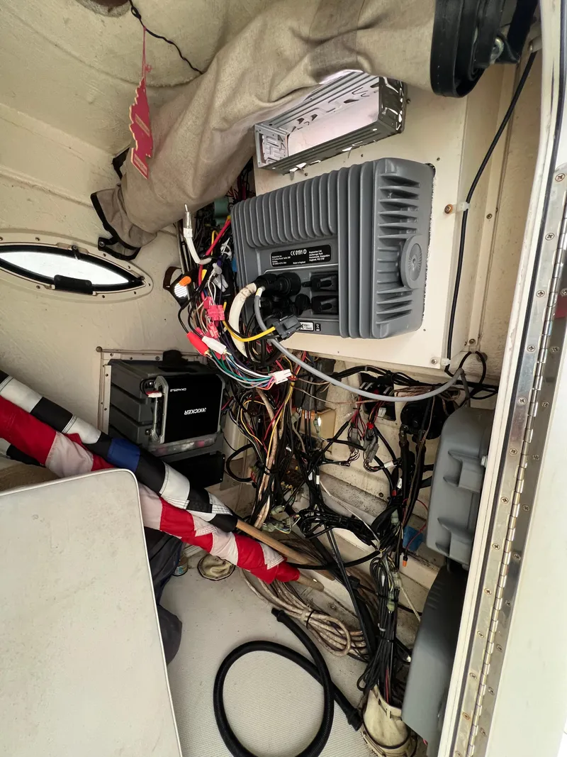 Slide: The Image of Interior wiring and electronics of a 1998 World Cat 270TE boat. - 18