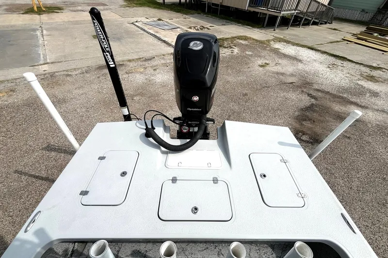 Slide: The Image of 2018 Majek 25 Extreme boat with motor and storage compartments. - 3
