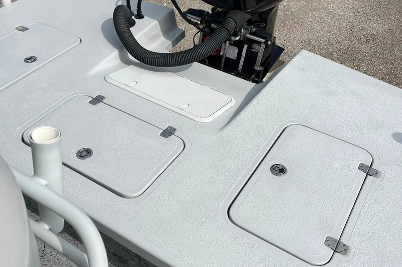 Slide: The Image of 2018 Majek 25 Extreme boat deck with storage compartments and motor mount. - 4