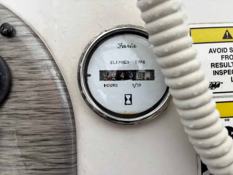 Slide: The Image of Hour meter on 2014 Carolina Skiff JVX18CC boat dashboard, showing elapsed time. - 6