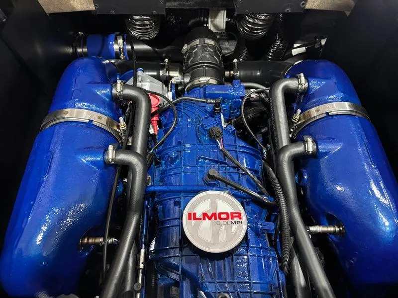 Slide: The Image of Ilmor engine in 2025 MasterCraft NXT22 boat, showcasing blue components and advanced design. - 13
