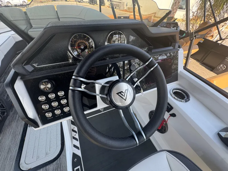 Slide: The Image of Steering wheel and dashboard of 2025 Viaggio Diamante Q boat. - 8
