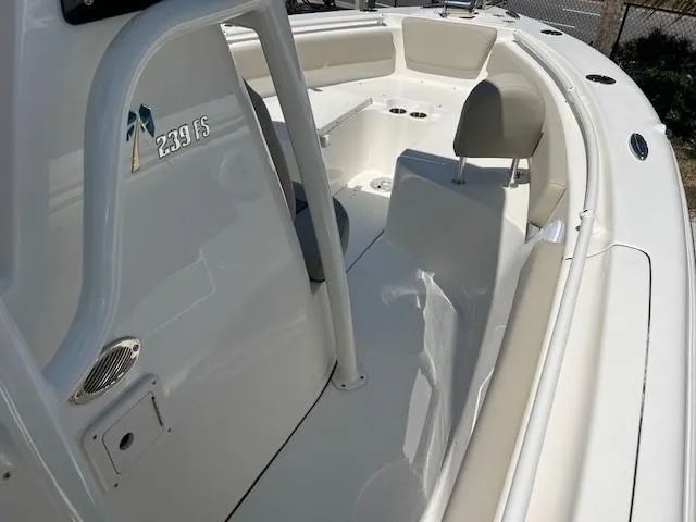 Slide: The Image of 2025 Key West 239 FS boat interior with seating and console. - 11