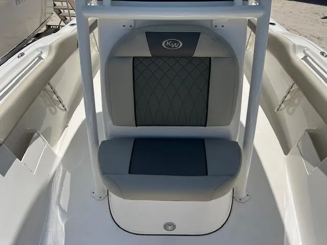 Slide: The Image of 2025 Key West 239 FS boat seat with gray upholstery and diamond pattern design. - 13