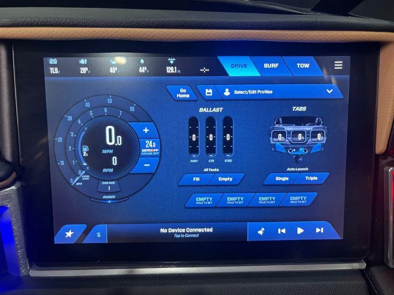 Slide: The Image of 2025 MasterCraft XT24 touchscreen display showing speed, ballast, and tab controls. - 14