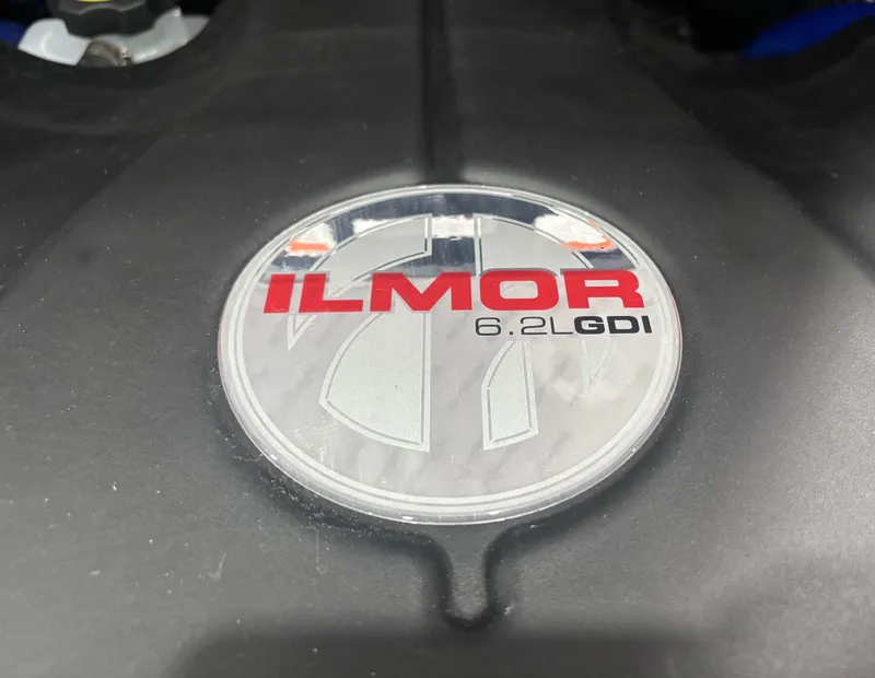 Slide: The Image of Ilmor 6.2L GDI engine badge on 2025 MasterCraft XT24 boat. - 16