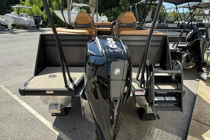 Slide: The Image of 2025 Viaggio Lago X-Q boat with powerful V6 engine, docked in a marina. - 3