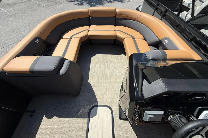 Slide: The Image of Luxurious seating area on 2025 Viaggio Lago X-Q boat, featuring tan and gray upholstery. - 6