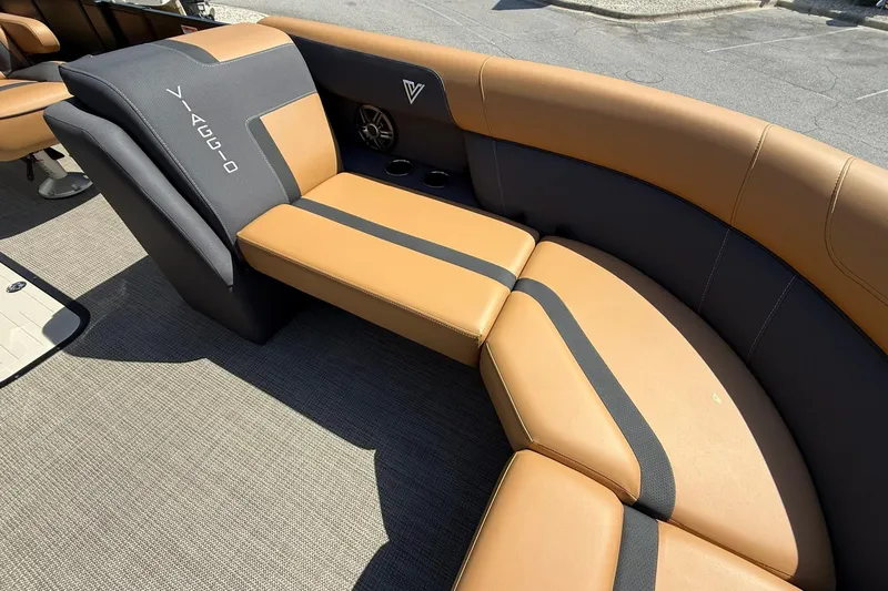 Slide: The Image of Luxurious seating on 2025 Viaggio Lago X-Q boat, featuring tan and black upholstery. - 7