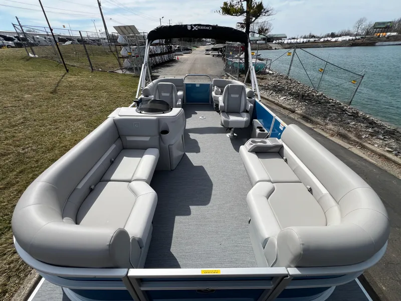 Slide: The Image of 2025 Godfrey Xperience Split Bench pontoon boat with spacious seating and modern design. - 7