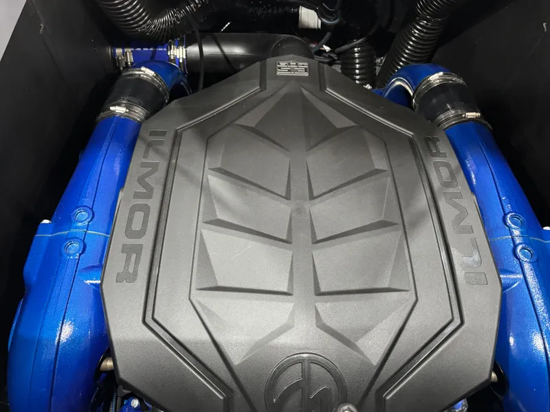 Slide: The Image of 2025 MasterCraft XT23 engine with blue accents and bold design. - 13