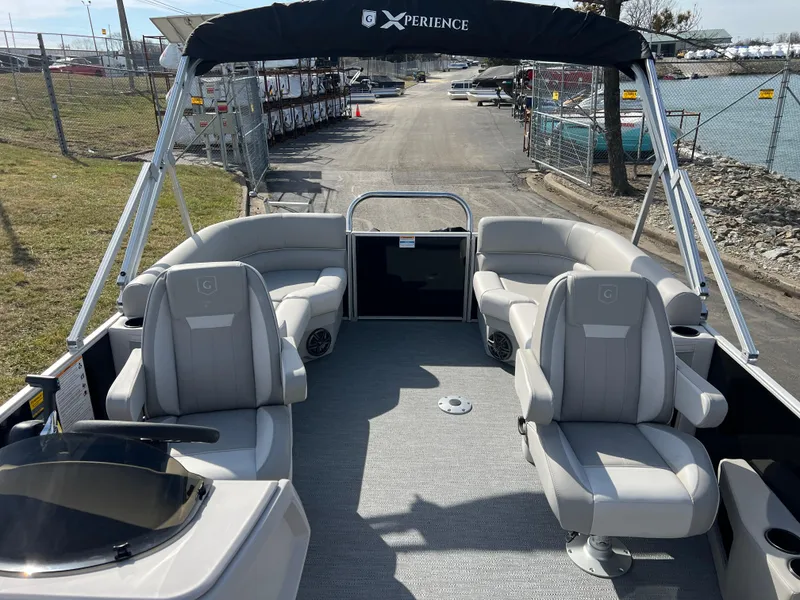 Slide: The Image of 2025 Godfrey Xperience Split Bench boat with spacious seating and sleek design. - 10