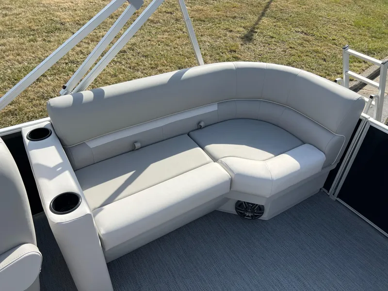 Slide: The Image of 2025 Godfrey Xperience Split Bench with cup holders on a boat deck. - 13
