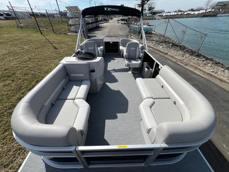 Slide: The Image of 2025 Godfrey Xperience Split Bench pontoon boat with spacious seating and modern design. - 6