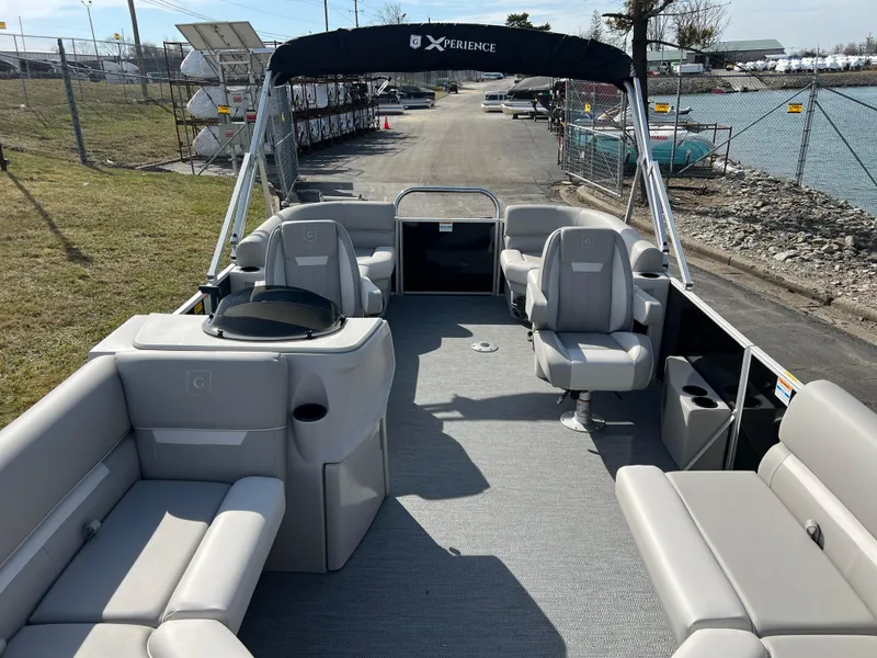 Slide: The Image of 2025 Godfrey Xperience Split Bench boat with spacious seating and modern design. - 7