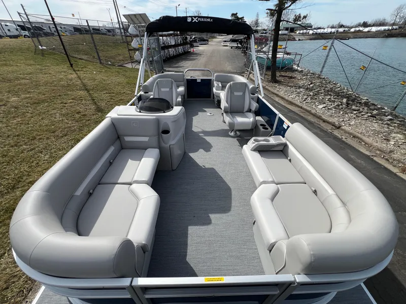 Slide: The Image of 2025 Godfrey Xperience Split Bench pontoon boat with spacious seating and modern design. - 6