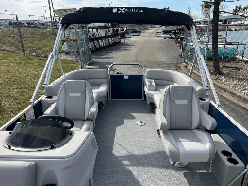 Slide: The Image of 2025 Godfrey Xperience Split Bench boat with spacious seating and modern design. - 9