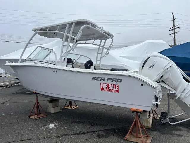 The Image of 2025 Sea Pro 240 Dual Console boat for sale, displayed on stands. - 0