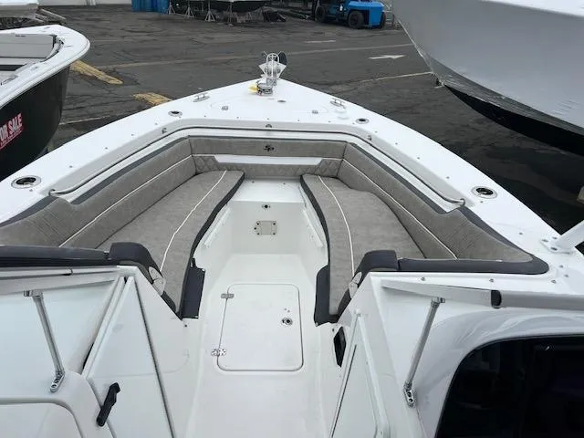 Slide: The Image of 2025 Sea Pro 240 Dual Console boat with spacious seating and sleek design. - 14