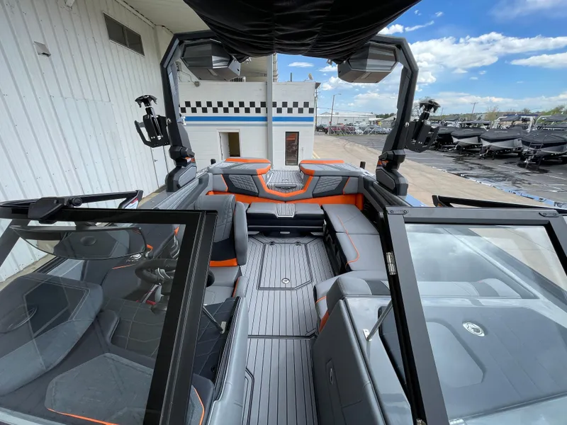 Slide: The Image of 2023 Nautique Super Air Nautique G21 interior with sleek seating and modern design. - 13