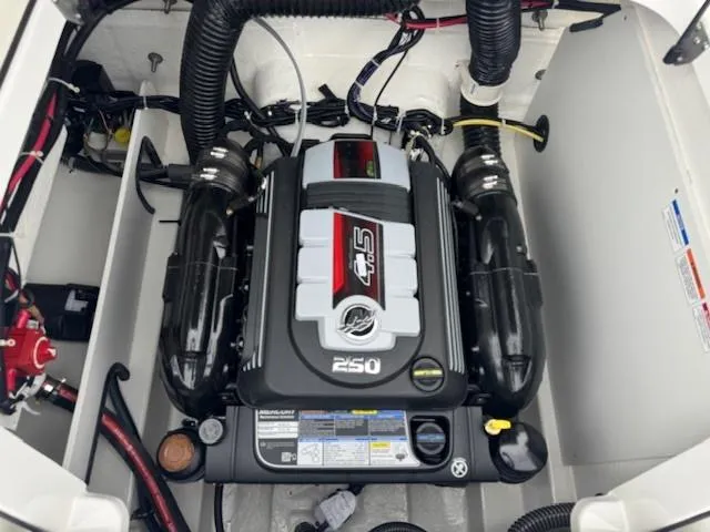 Slide: The Image of 2025 Bayliner VR6 Bowrider I/O engine compartment with 4.5L 250 HP engine. - 13