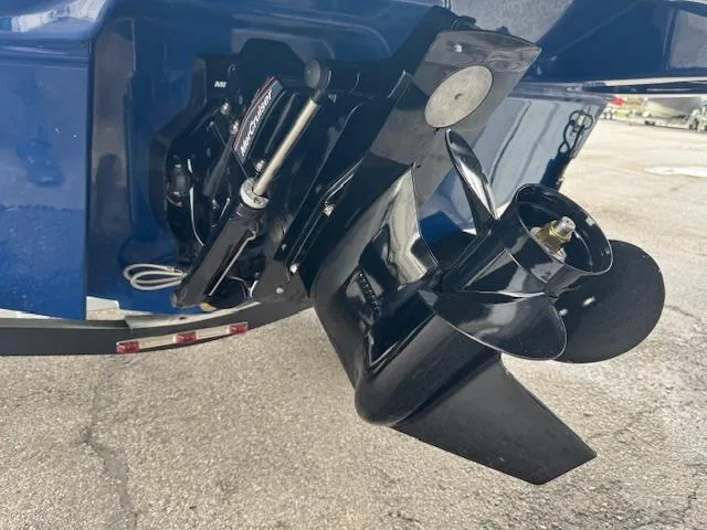 Slide: The Image of 2025 Bayliner VR6 Bowrider I/O boat engine and propeller detail. - 14