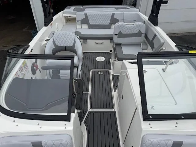 Slide: The Image of 2025 Bayliner VR6 Bowrider I/O interior with modern seating and sleek design. - 2