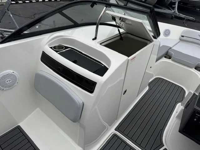 Slide: The Image of 2025 Bayliner VR6 Bowrider I/O interior with sleek seating and storage compartments. - 8