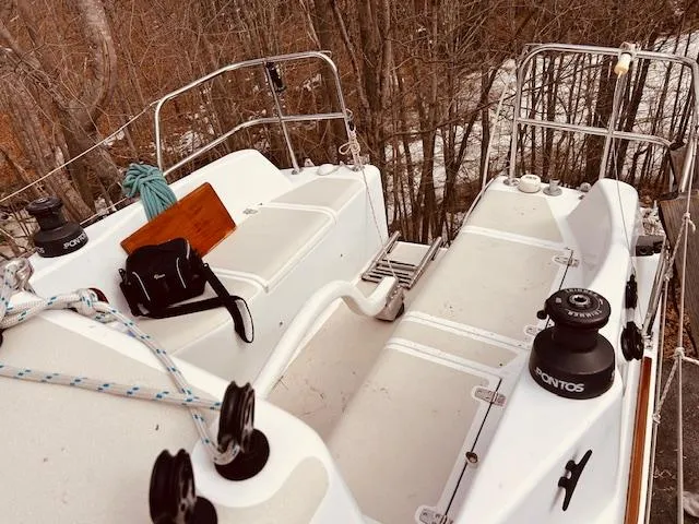 Slide: The Image of Deck view of 2006 Robert Perry Far Harbour 39 sailboat, featuring winches and seating. - 10