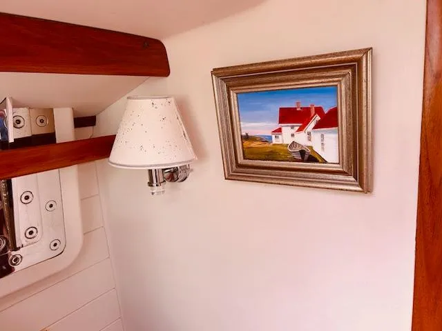 Slide: The Image of Interior of 2006 Robert Perry Far Harbour 39 yacht with framed painting and wall lamp. - 24