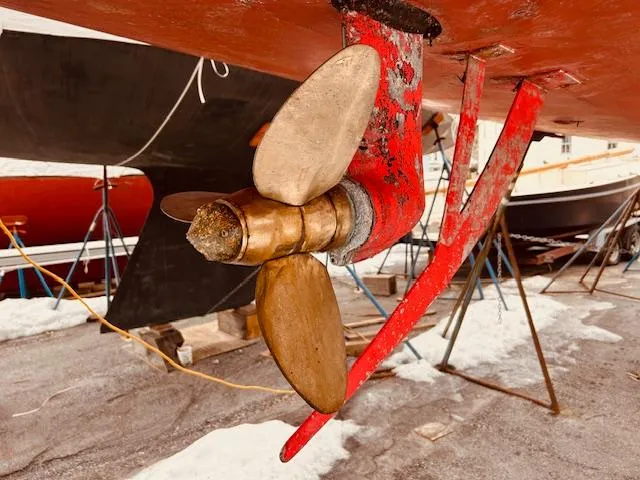 Slide: The Image of Propeller and rudder of 2006 Robert Perry Far Harbour 39 sailboat in dry dock. - 3