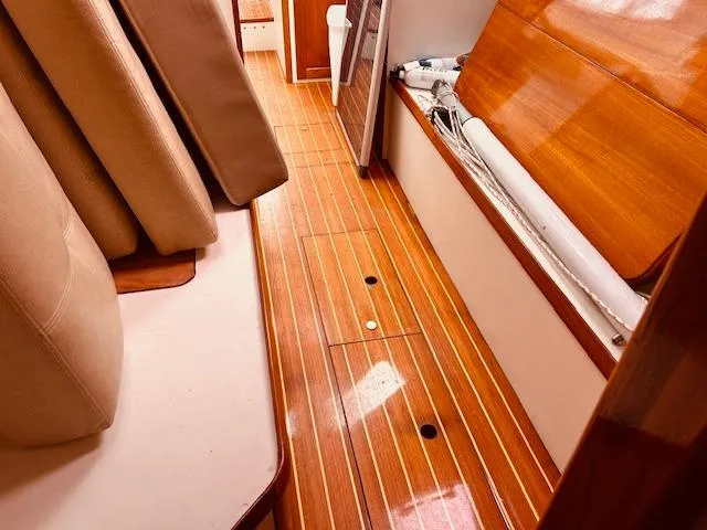 Slide: The Image of Interior of 2006 Robert Perry Far Harbour 39 yacht with polished wood flooring. - 30