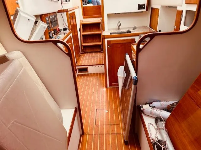 Slide: The Image of Interior of 2006 Robert Perry Far Harbour 39 sailboat with wooden flooring and cabinetry. - 31