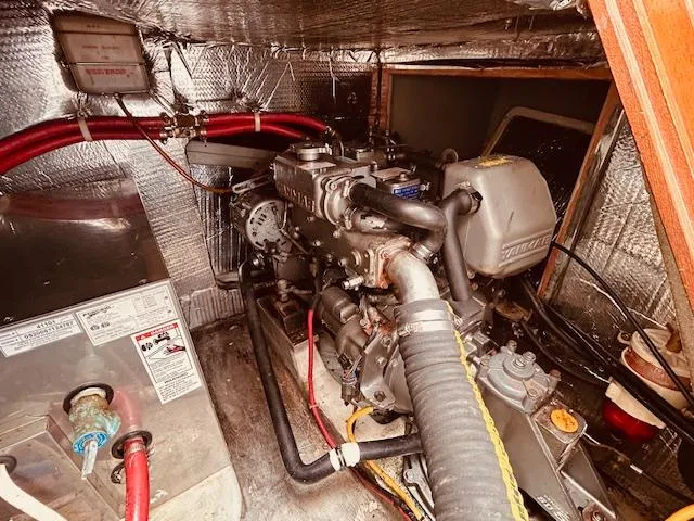 Slide: The Image of Engine room of 2006 Robert Perry Far Harbour 39 yacht, featuring mechanical components and insulation. - 36