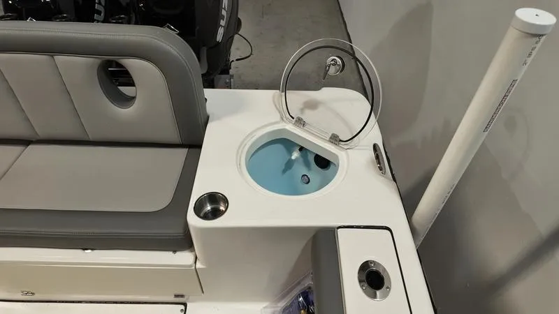 Slide: The Image of 2024 Sea Born LX 24 LE boat interior with seating and livewell. - 7