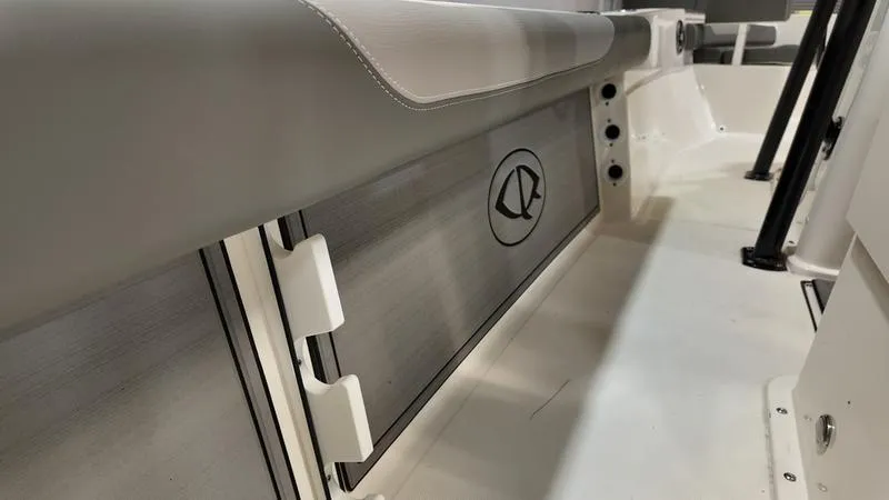 Slide: The Image of 2024 Sea Born LX 24 LE boat interior with sleek seating and storage design. - 9