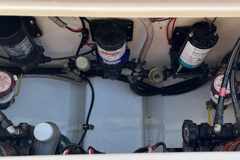 Slide: The Image of 2015 Sea Hunt Gamefish 30 boat wiring and pump system close-up. - 10